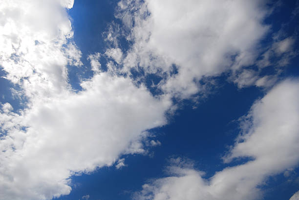 istock Fluffy clouds in the blue sky, scenic and bright 2236290711