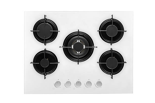 Chic white color gas stove top burner on white background with clipping path