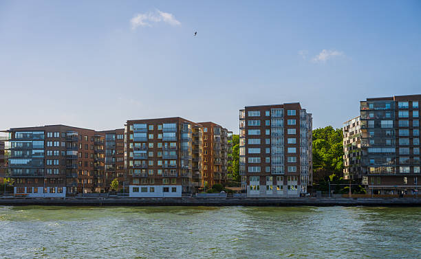 istock Cluster of modern waterfront residential apartments.. 2236296034