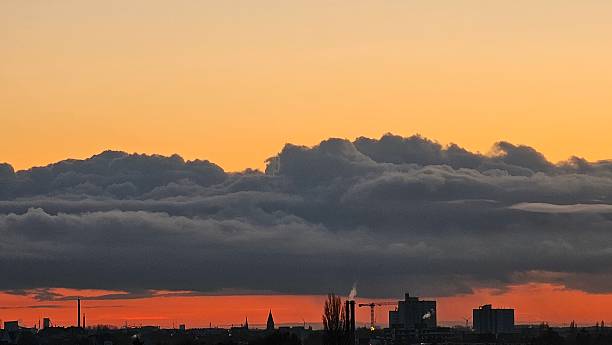 istock ​Industrial City Silhouette at Dusk 2236296505