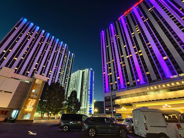 Moscow, Russia - September 07, 2025: Izmailovo Hotel Complex, a large hotel complex in Moscow, known for its distinctive architecture and vibrant lighting, especially visible at night. It comprises several hotel buildings, including Alfa, Beta, Vega, Gamma, and Delta. These are Alfa and Beta buildings