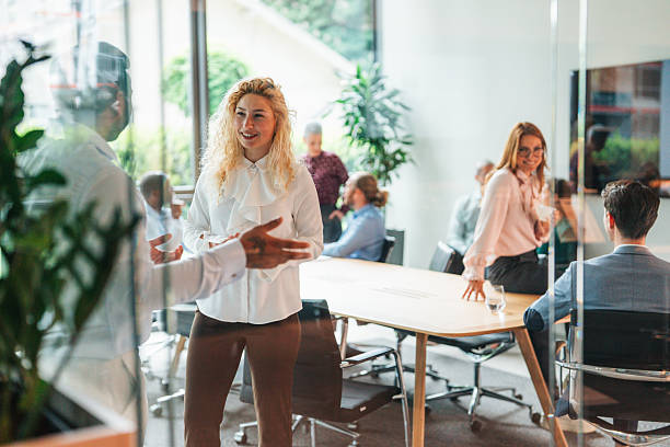 istock Business colleagues talking in the office 2236314090