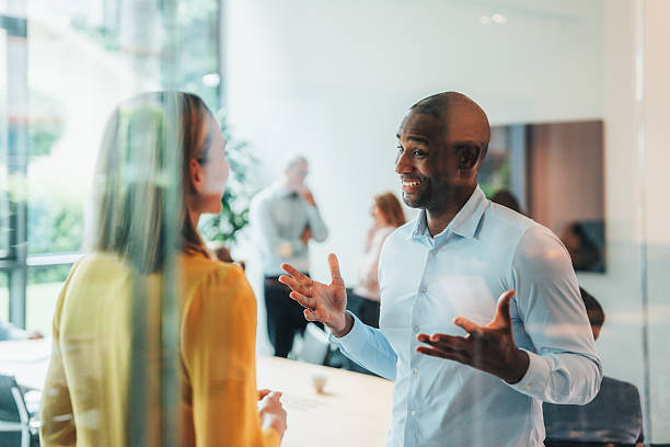 istock Business colleagues talking in the office 2236314097