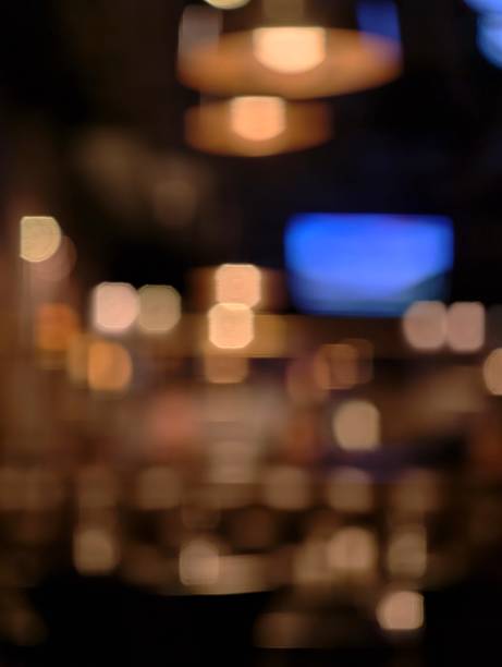 istock Blurred, out-of-focus view, an urban or interior setting at night 2236315748