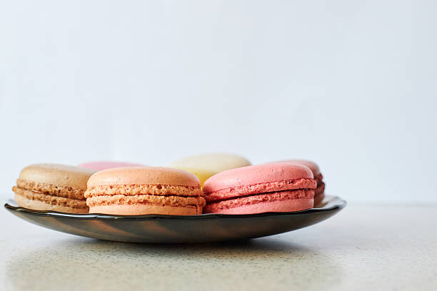 Bright French Macarons on plate, side view