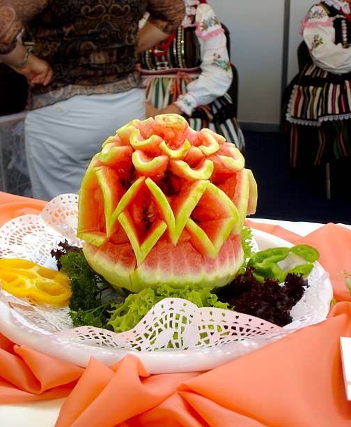 istock Intricate Watermelon Slice Pattern Adorns a Vibrant Platter at a Festive Culinary Showcase Event 2236319164