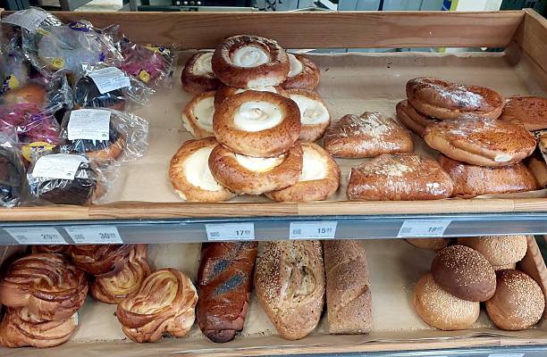istock Freshly Baked Rolls and Pastries Available in Bakery Display at Local Shop 2236319405