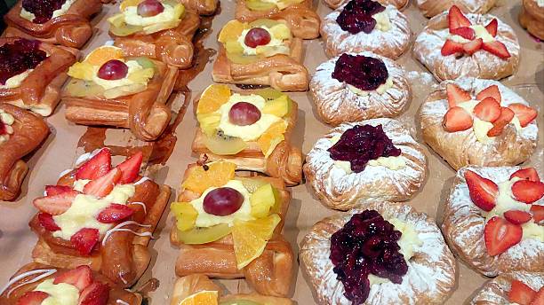 istock Colorful Sweet Pastries Arranged Neatly in Rows at a Bakery 2236320248