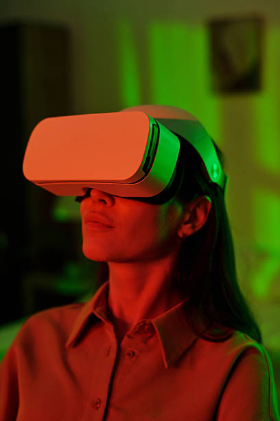 istock Woman Immersing in Virtual Reality Experience at Home 2236326058