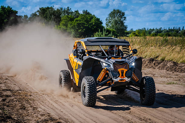 istock ATV, UTV, buggy, rally riding in dusty track. Amateur competitions 2236326488