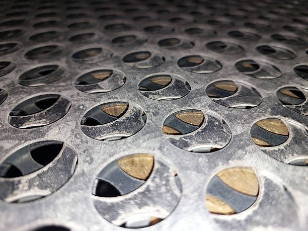 istock Stainless Steel Mesh Surface Showcasing Intricate Patterns and Textures in Direct Light 2236328035