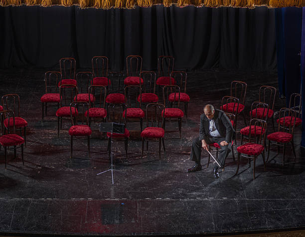 Conceptual image of music conductor in empty room