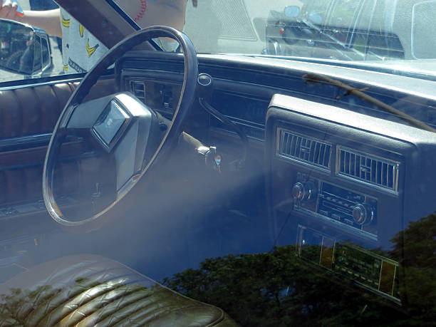 Hamburg, Germany - April 7. 2025: Steering wheel and dashboard of a classic Chrysler car from the 1950s - in the outskirts of Hamburg