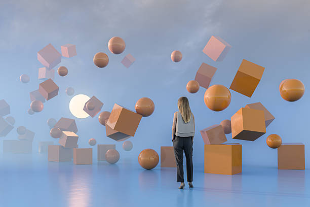istock Woman watching floating geometric shapes in VR environment 2236340030