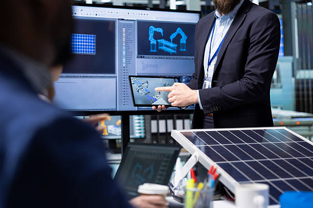 istock Factory businessmen doing sales pitch for shareholders using tablet 2236342903