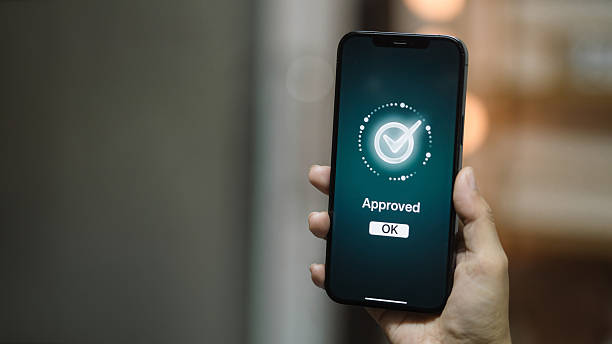 istock Approval Success on Smartphone Screen  Verification and Secure Fintech Confirmation 2236346519