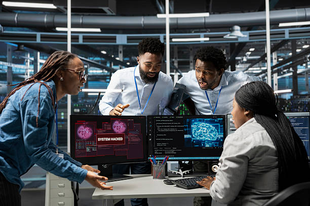 istock Data center cybersecurity division coworkers scared by security breach 2236352384