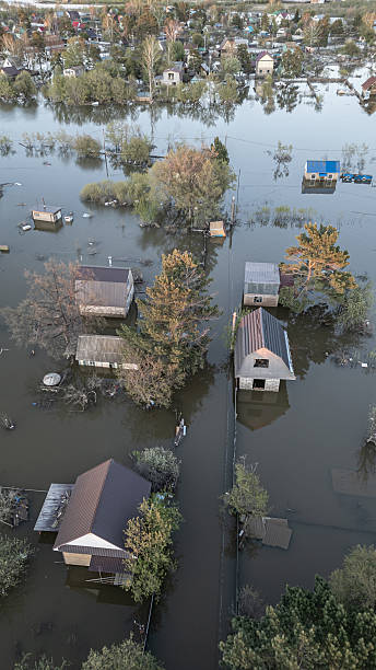 istock Global warming,climate change.Tsunami.Storms and destruction.Floods on the planet.The apocalypse, catastrophes.Natural disasters the riot.The remnants of human life are floating in dirty water.The end 2236353649