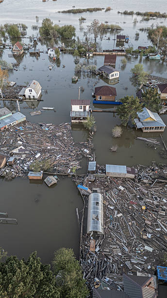 istock Global warming,climate change.Tsunami.Storms and destruction.Floods on the planet.The apocalypse, catastrophes.Natural disasters the riot.The remnants of human life are floating in dirty water.The end 2236353652
