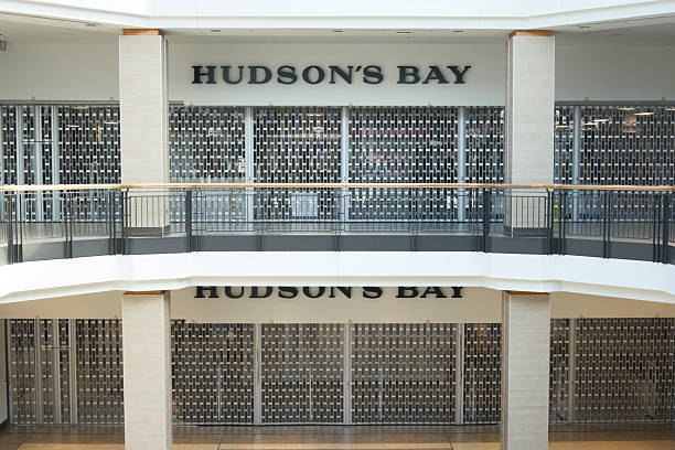Toronto, Canada - September 13, 2025:  Two-storey Hudson’s Bay inside a Toronto shopping mall with security gates, permanently closed as of June 1, 2025.