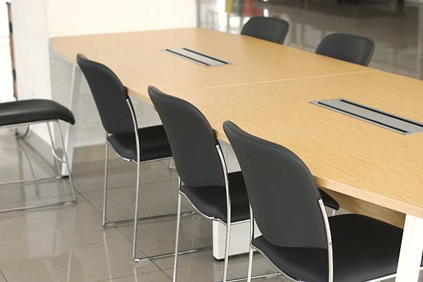 istock Modern office meeting room with conference table and chairs 2236359602