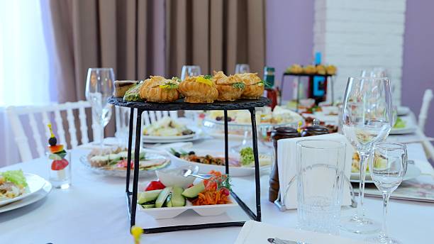 istock Elegant profiteroles and pastries artfully positioned on white draped table, showcasing gourmet dessert presentation during luxurious dining event 2236363754