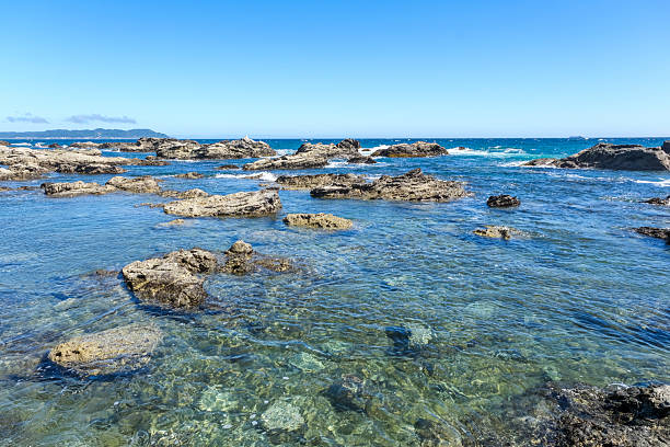 A coastline of eroded rocks on the western tip of the Boso Peninsula