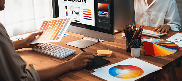 istock Graphic designer works on computer laptop with digital pen. Scrutinize 2236370729