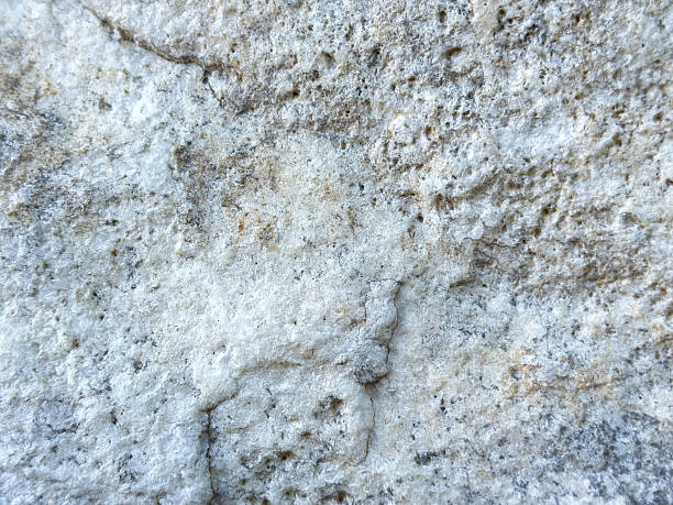 istock Close-up of natural stone texture with weathered surface patterns 2236371725