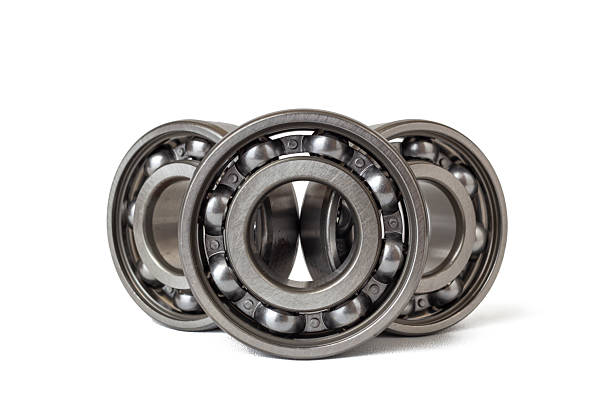 istock View of three steel ball bearings arranged in a row. 2236376165