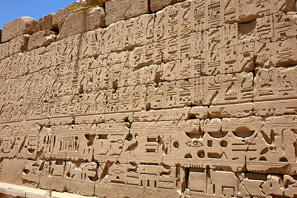 istock Exploring the Ancient Hieroglyphs and Bas Reliefs of Karnak Temple Complex in Egypt 2236378306