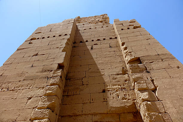 istock Exploring the Ancient Pylons of Karnak Temple Complex in Egypt Under a Clear Blue Sky 2236378355