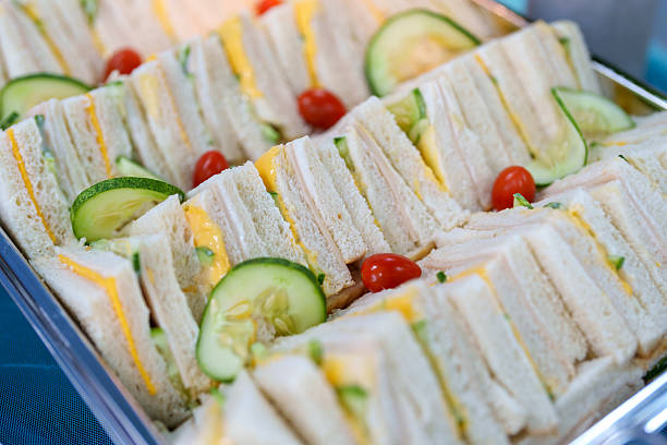istock Assorted Sandwiches with Ham, Cheese, Cucumber, and Cherry Tomatoes 2236379323