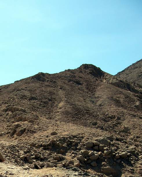 istock Mountains in Sinai, Egypt, Showcase Rugged Terrain Under a Clear Blue Sky During Daylight Hours 2236380319