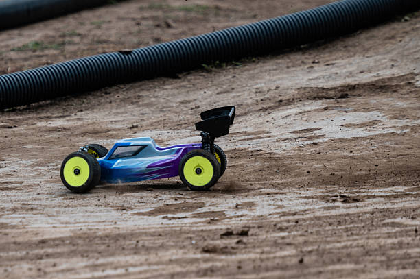 istock Radio-controlled car driving on dirt track 2236381107