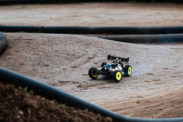 istock Radio-controlled car drifting on dirt track 2236381199