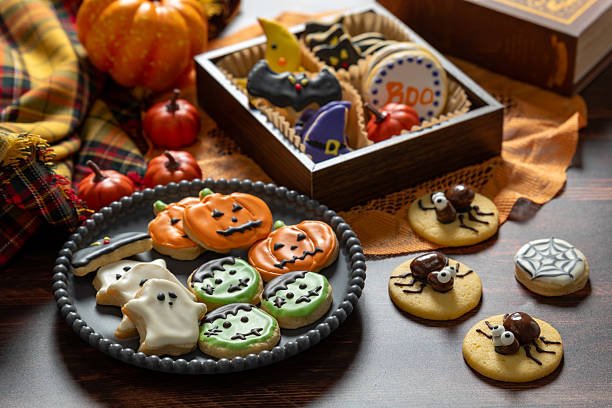 istock Halloween homemade cookies on rustic wooden table 2236386974