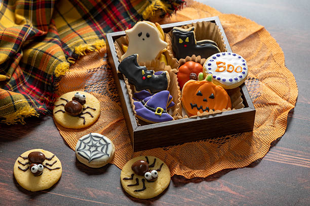 istock Halloween homemade cookies on rustic wooden table 2236386977