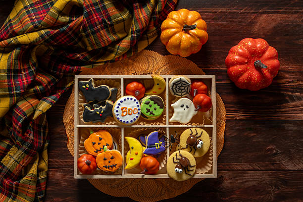 istock Halloween homemade cookies on rustic wooden table 2236386986