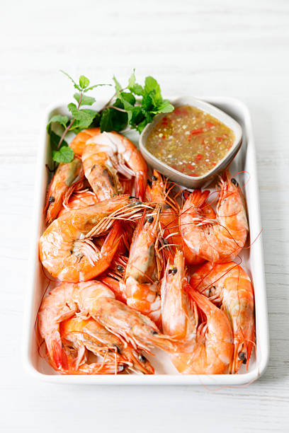 istock Grilled shrimps with spicy sauce in a white tray. 2236387838