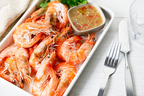 istock Grilled shrimps with spicy sauce in a white tray. 2236387844