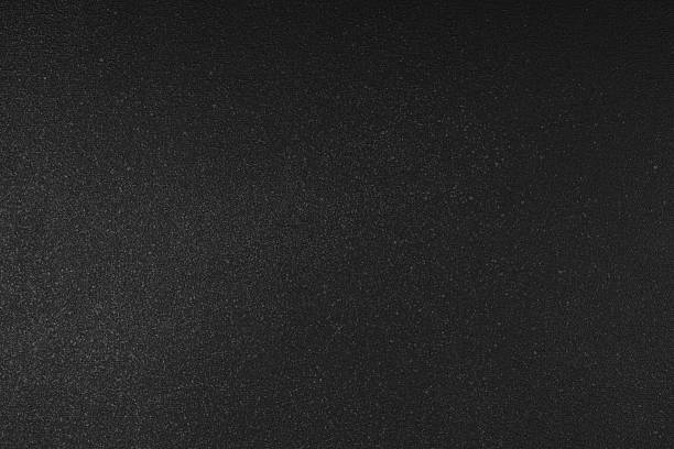 istock Abstract shiny, radiant texture background with of dark black color, grain textured backdrop 2236388204