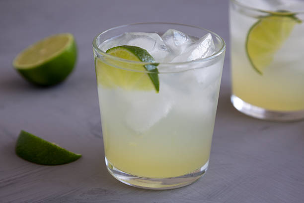 istock Homemade Cold Refreshing Iced Limeade in a Glass, low angle view. Close-up. 2236391875