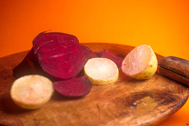 istock beet root and lemon juice : Refreshing beetroot and lemon juice, rich in vitamins, detoxifying properties, vibrant color, boosts energy, immunity, digestion, and overall health naturally 2236399304