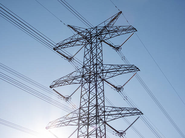 istock Electricity Transmission Tower Sun 2236400144