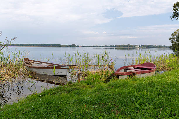 istock Two Boats on a Scenic Lake 2236402329
