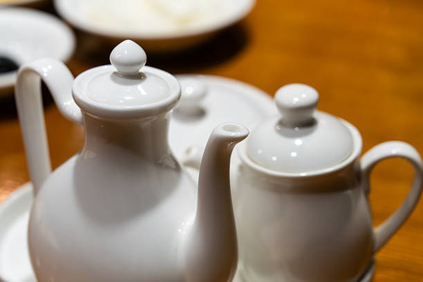 table setting with various white ceramic wares served at the Chinese restaurant