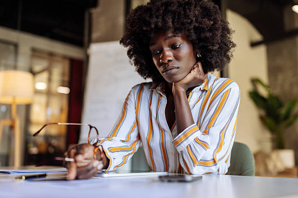 istock Focused Modern Professional Woman Working in a Stylish Office Environment 2236408253