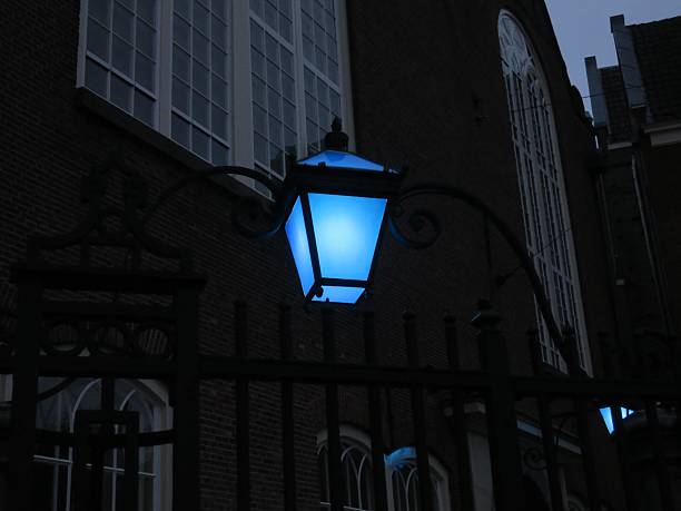 Vintage lamp with a candle and lights at night