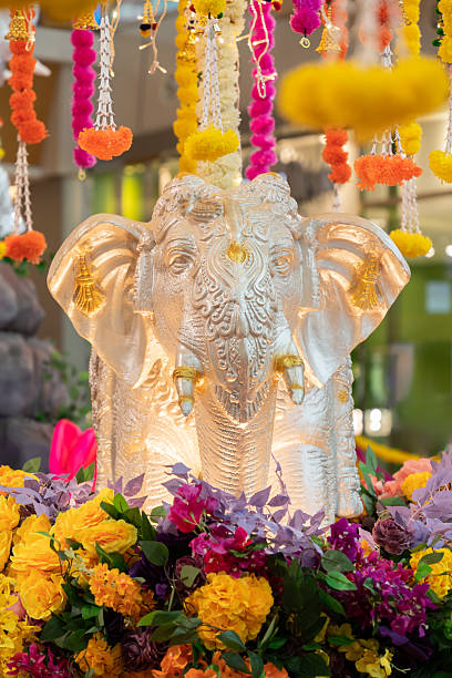 istock A richly adorned elephant statue centerpiece surrounded by bright marigolds and hanging garlands, capturing traditional festive decor, vivid colors, and a joyful sense of celebration Deepavali. 2236422107